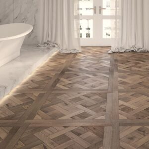 Real wood parquet floor made up of wood pieces glues into a rich pattern